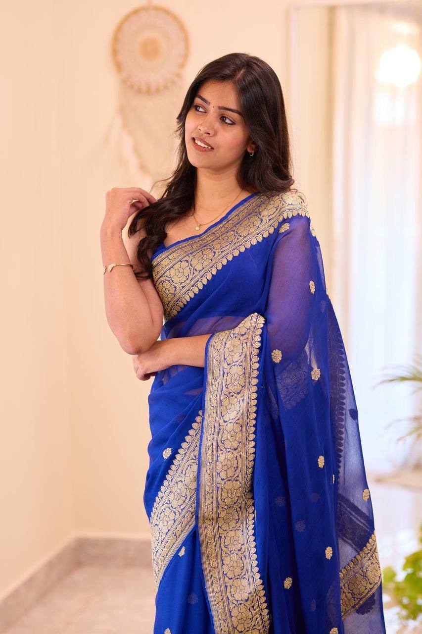 Royal Blue Soft Organza Saree with Heavy Golden Zari Embroidered Border, Elegant Butta Work, Transparent Sheer Pallu & Matching Blouse Piece
