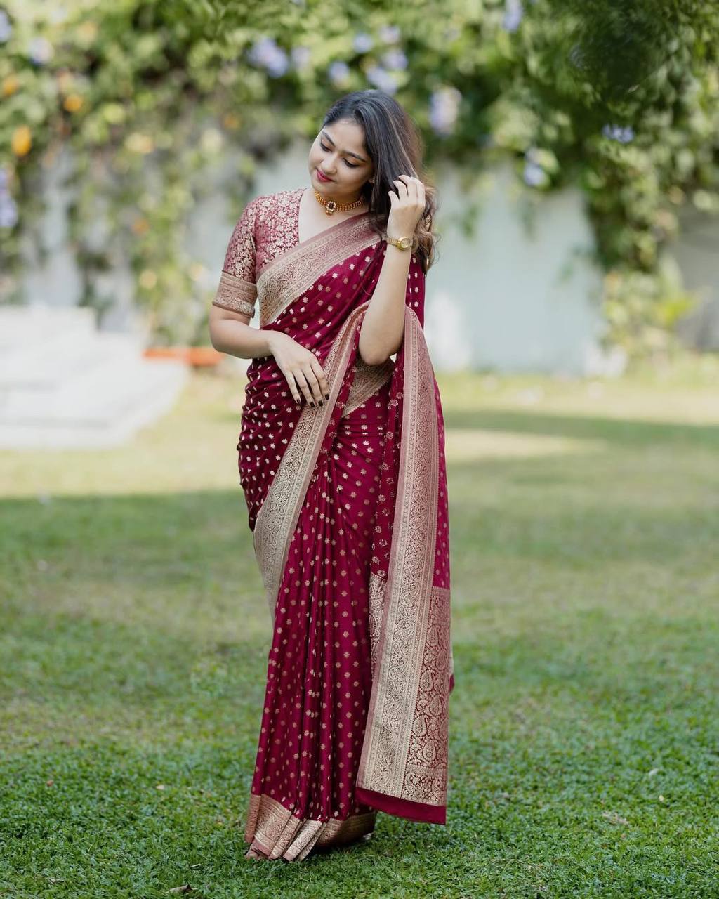 Elegant Maroon Soft Silk Saree with Rich Gold Zari Weaving, Intricate Traditional Border, and Graceful Festive & Wedding Wear Appeal