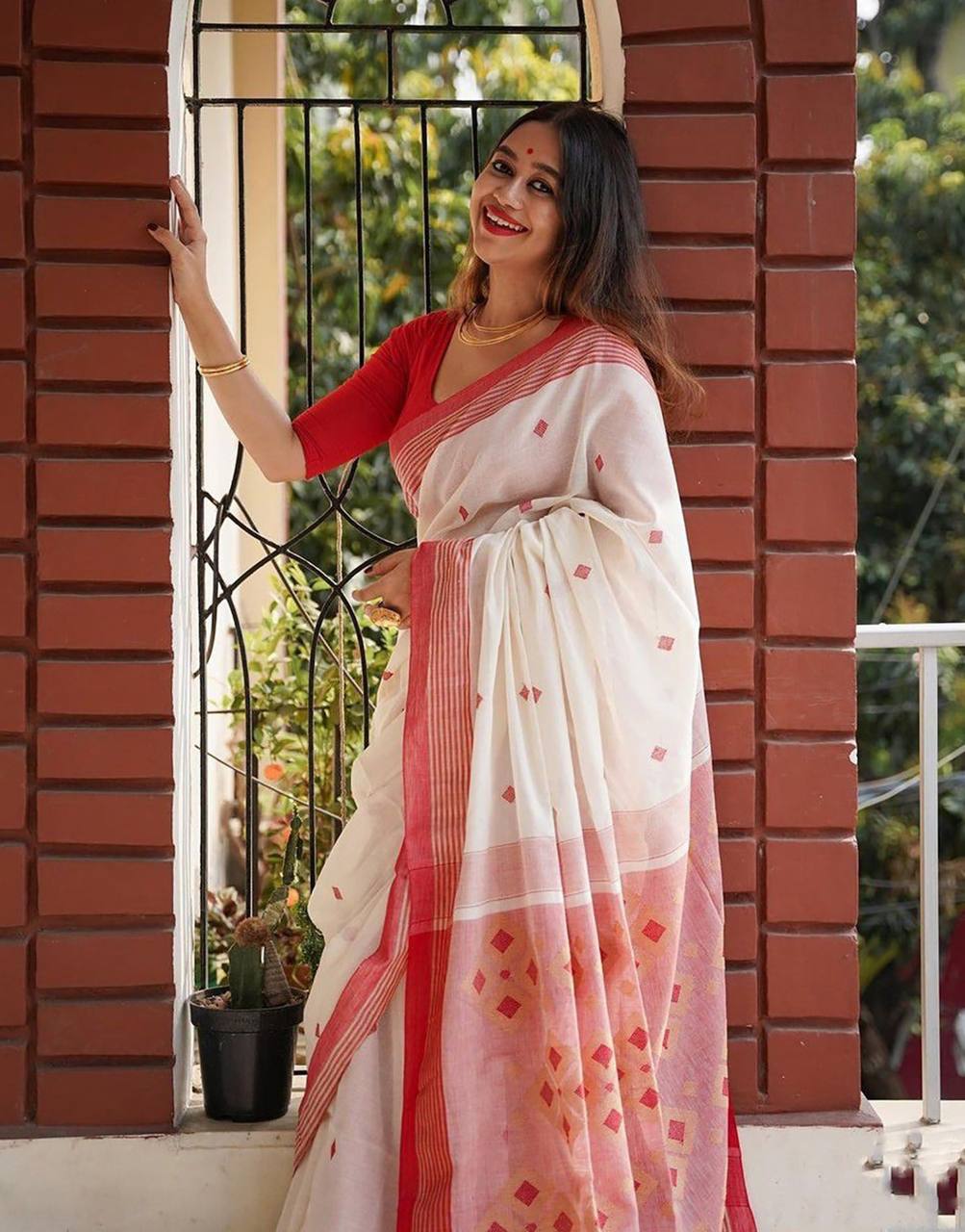 “Pure Cotton Handloom Saree in White and Red with Traditional Woven Motifs”