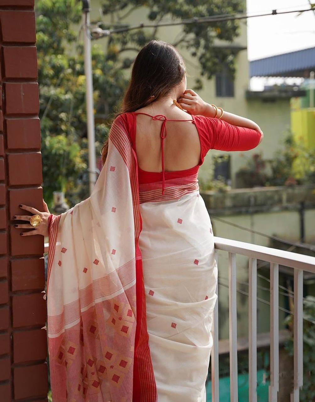 “Pure Cotton Handloom Saree in White and Red with Traditional Woven Motifs”