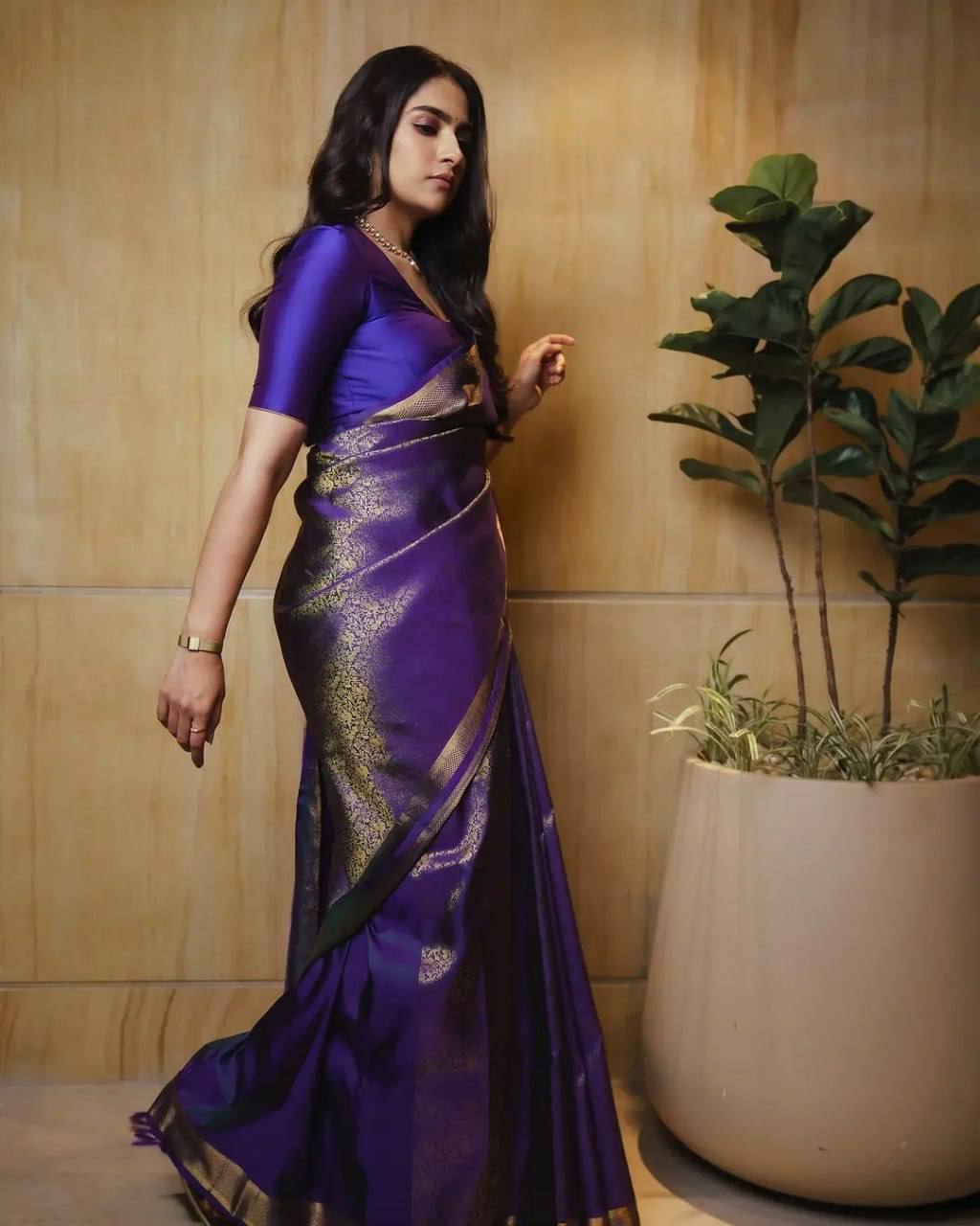 Royal Purple Soft Silk Saree with Elaborate Gold Zari Weaving, Premium Traditional Border, and Luxurious Festive & Wedding Wear Look