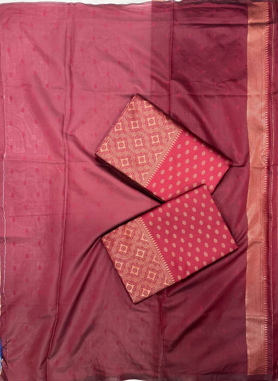 “Elegance Redefined in a Classic Maroon Saree Woven with Traditional Craftsmanship”